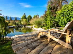 Lakefront Porch with wooden lounge chair