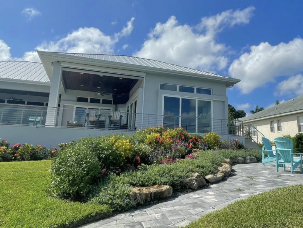 A beautiful, sustainable Florida Friendly Landscaping in Venice featuring native plants, mulched beds, and efficient irrigation.
